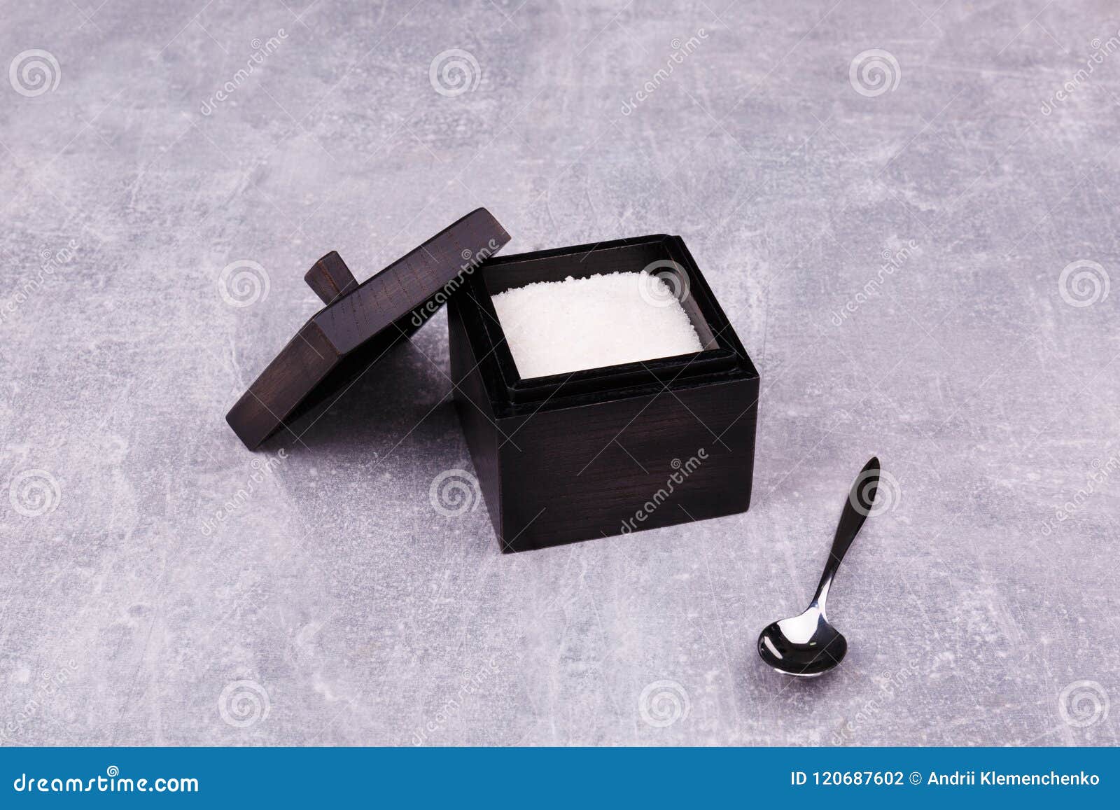 A Black Sugar Bowl with a Spoon Stock Photo Image of liquid