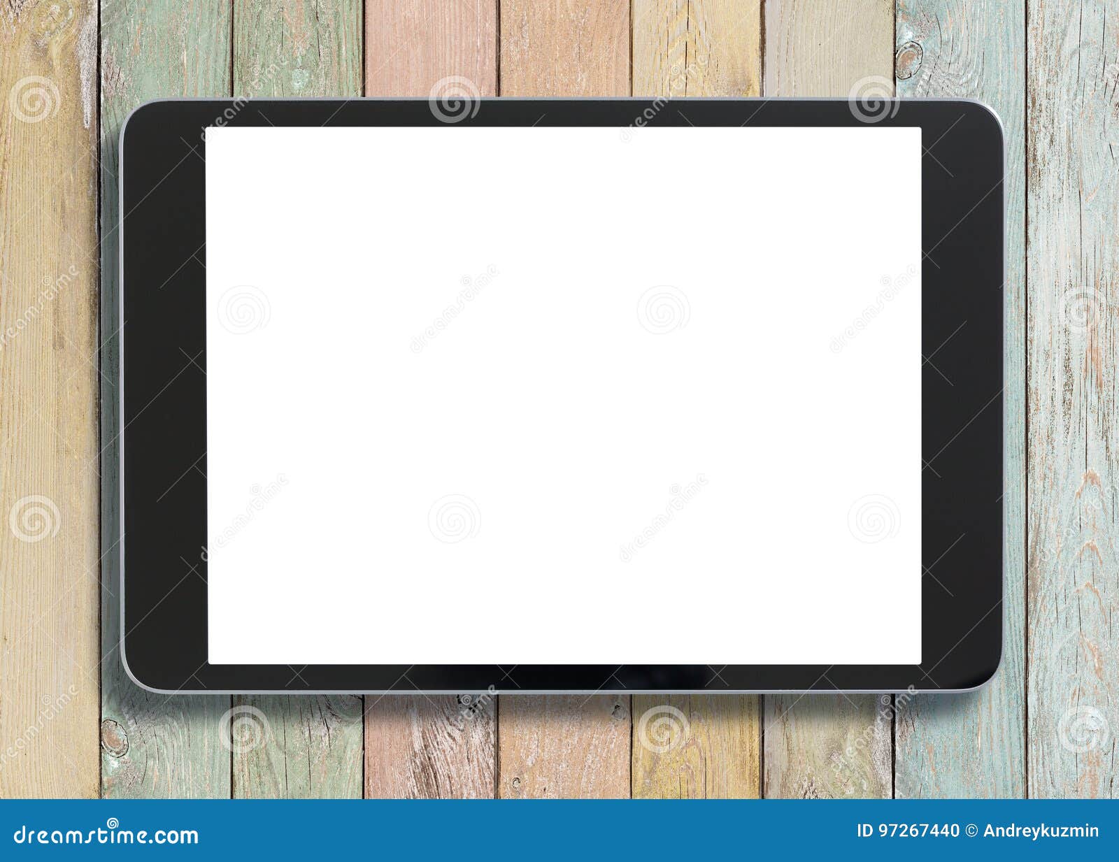 black tablet pc looking similar to ipad on old colorful wood background