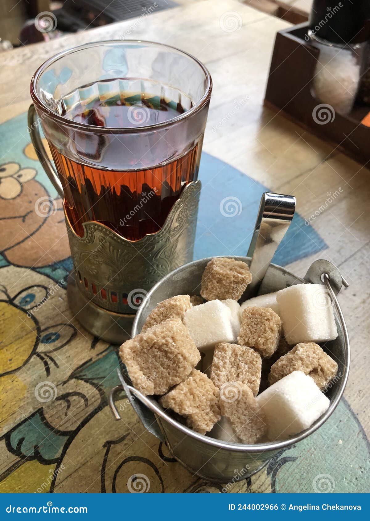 Black tea with sugar View stock photo. Image of black 244002966