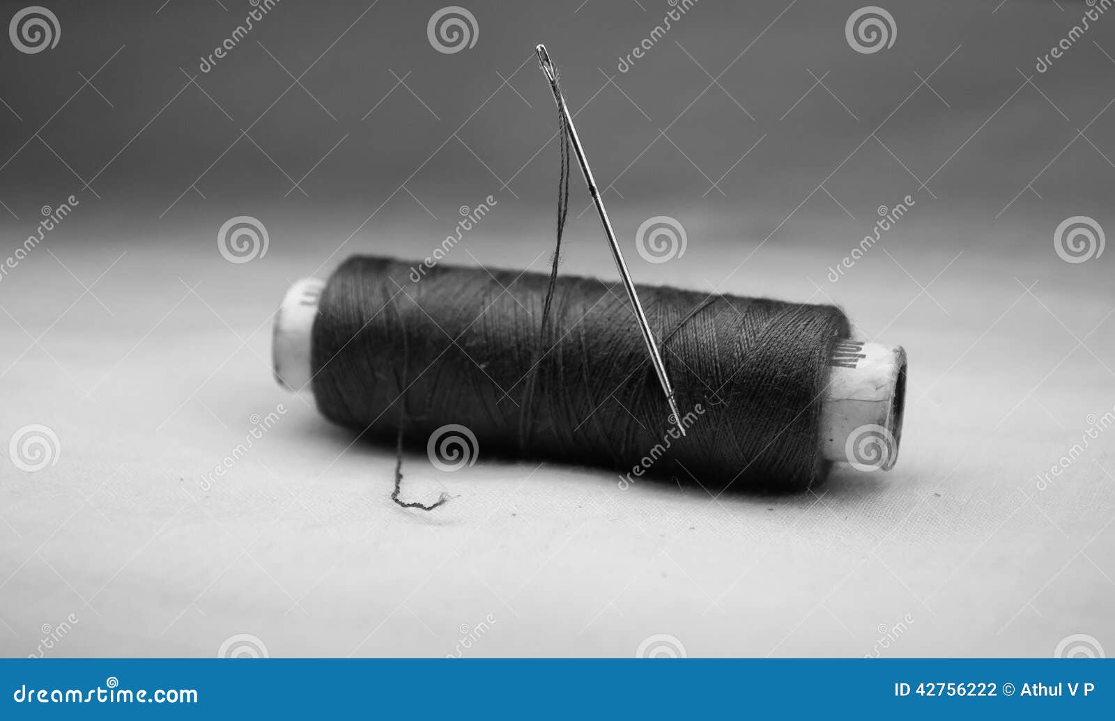 Black thread with needle stock photo. Image of black - 42756222