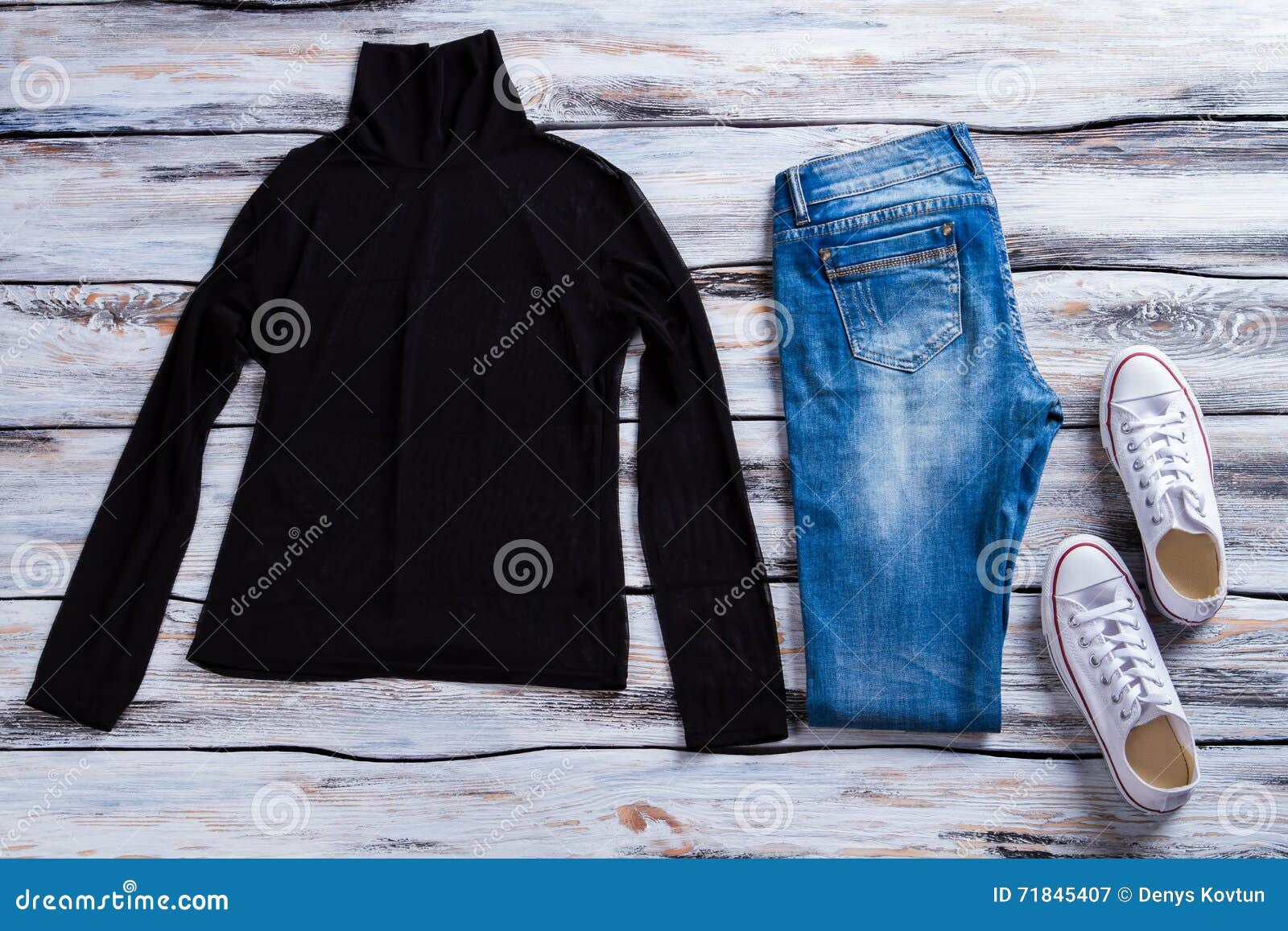 Black top with blue jeans. stock image. Image of canvas - 71845407