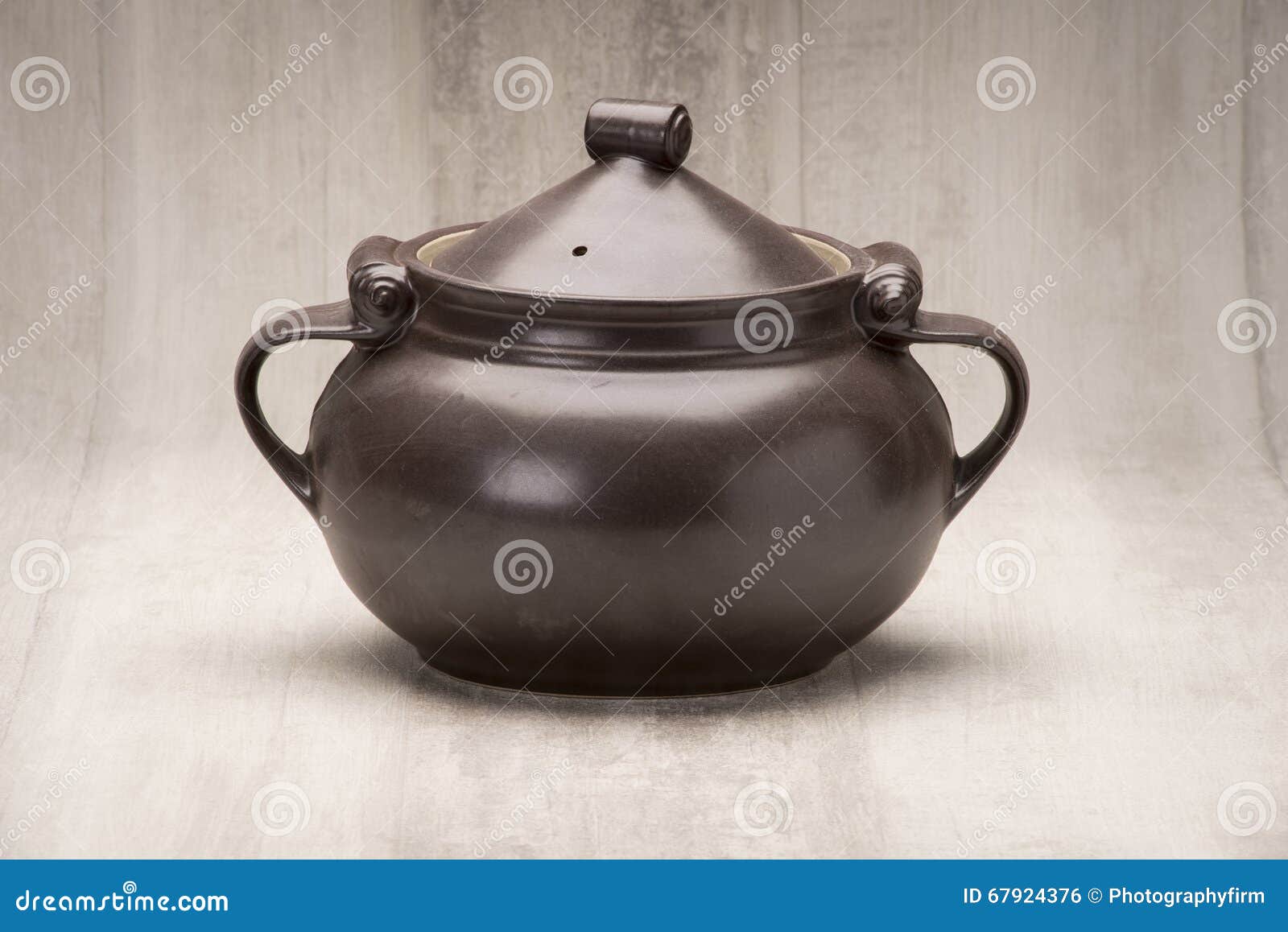 A Black Tureen or Soup Serving Bowl with Cover on Stock Photo Image