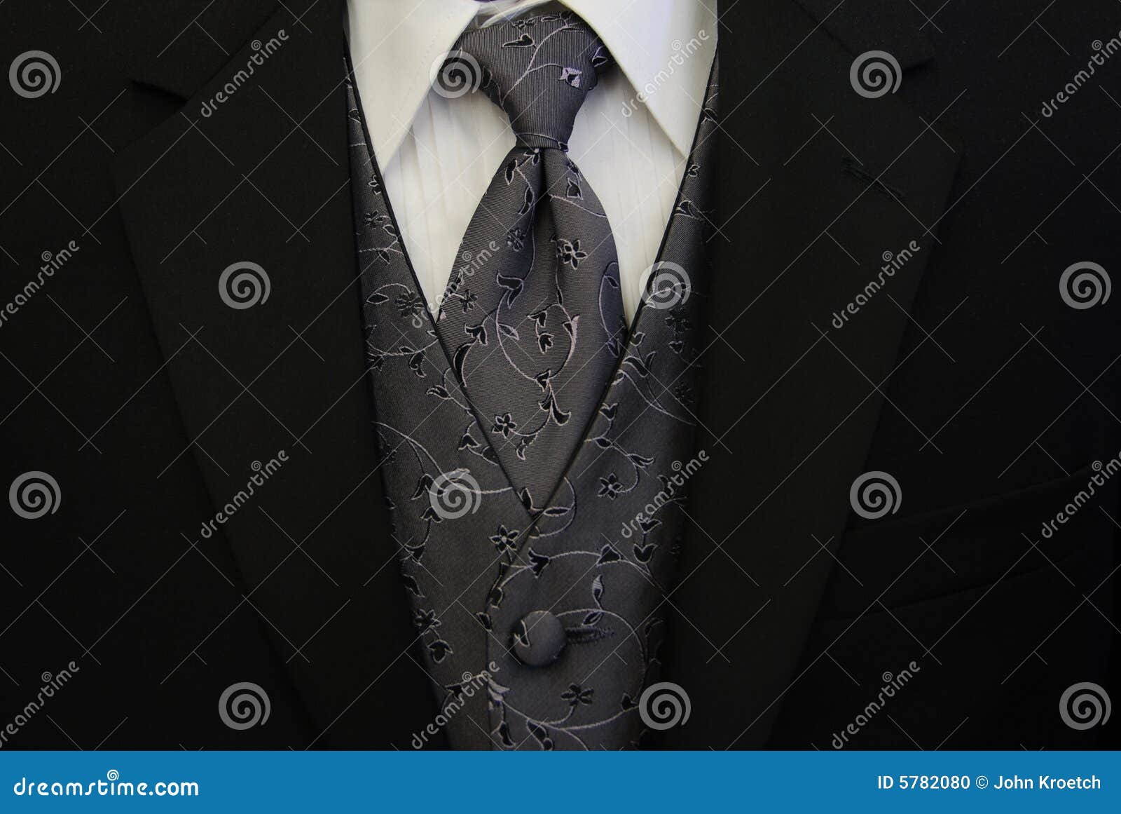 black tuxedo silver tie and vest