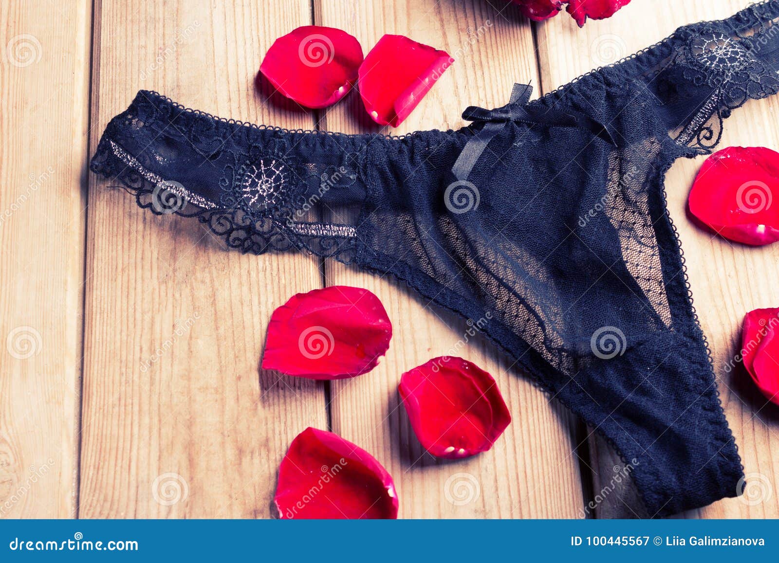 Black underwear and roses stock image. Image of underwear 100445567