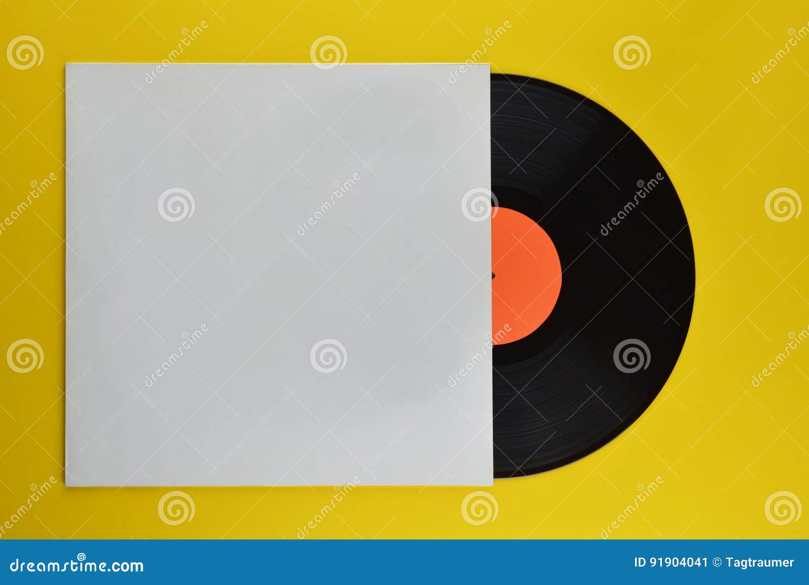 black vinyl record halfway out of white cover