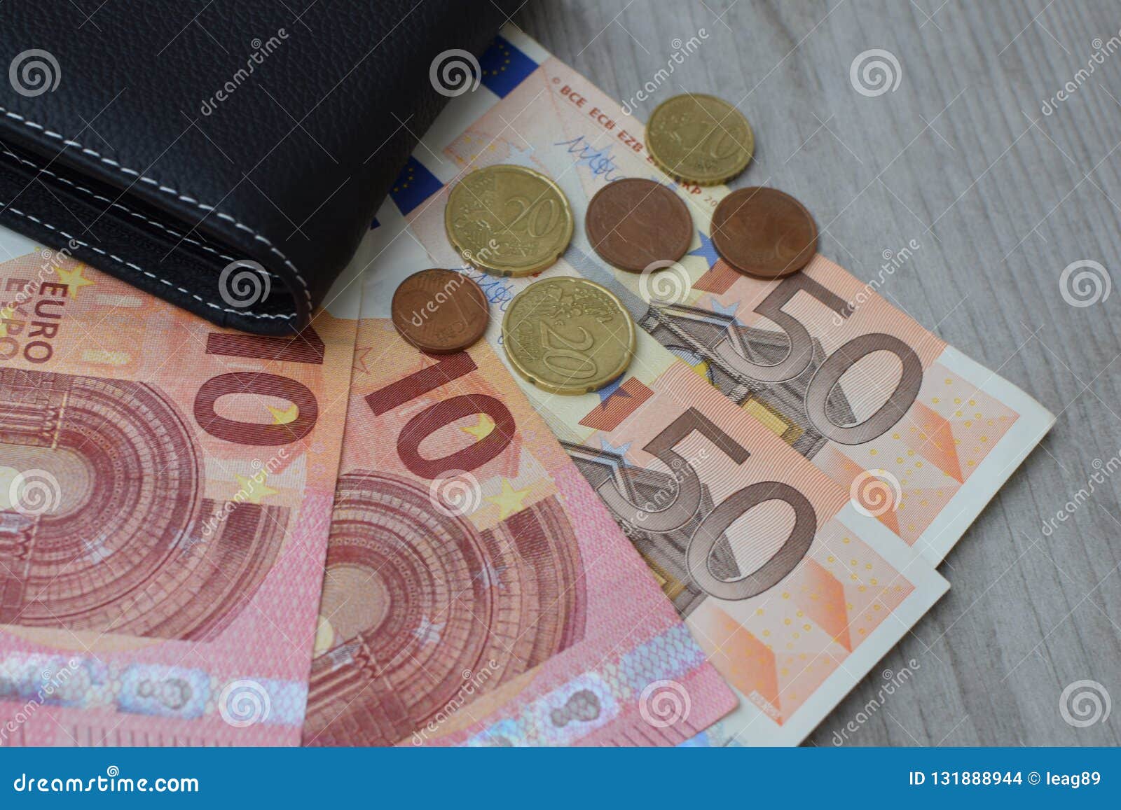 Black Wallet With Euro Currency Banknotes And Coins Stock Photo - Image of concept, money: 131888944