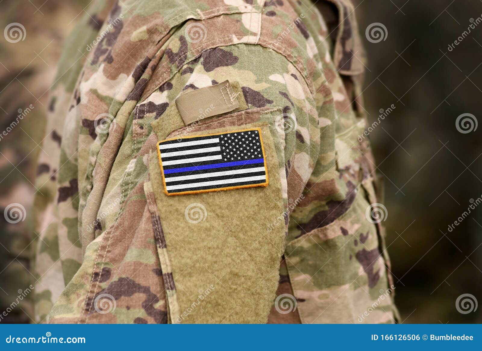 black and white american flag with thin blue line on military uniform. thin blue line flag. thin blue line flag law enforcement