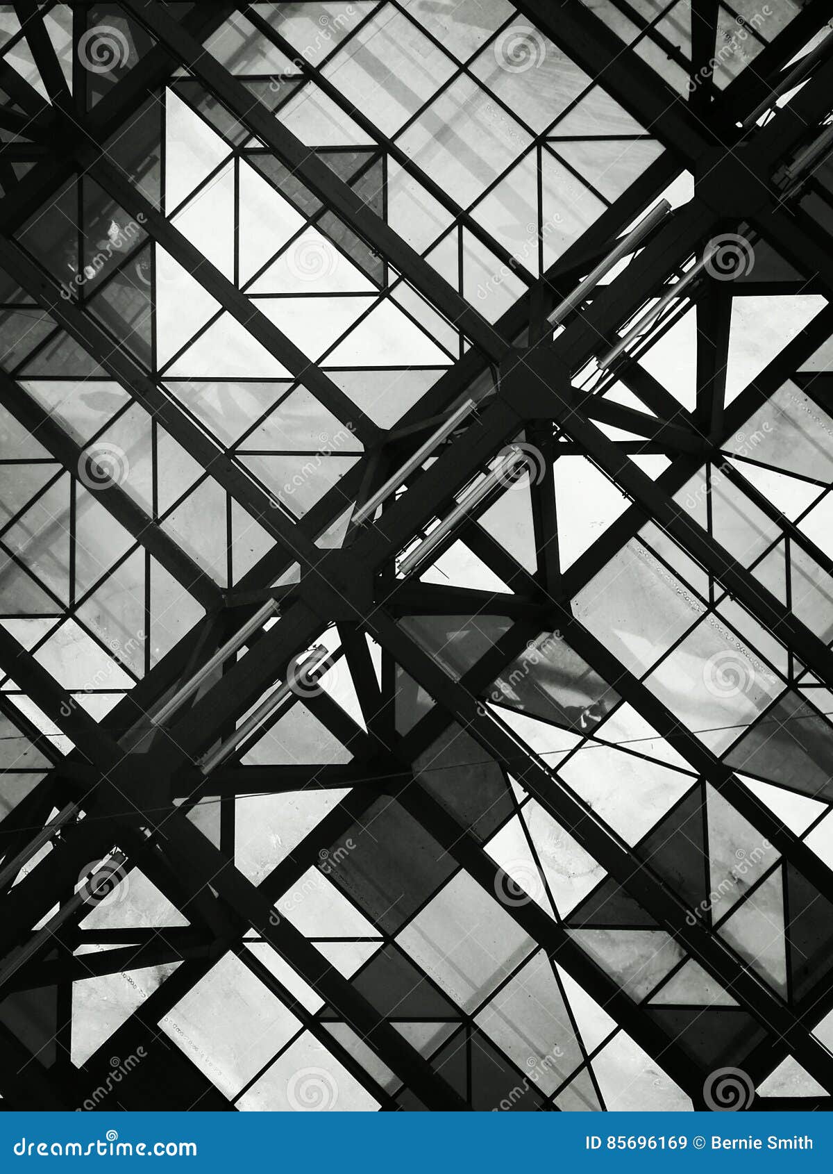 Black and White Photo of Glass Ceiling with Geometric Shapes Stock
