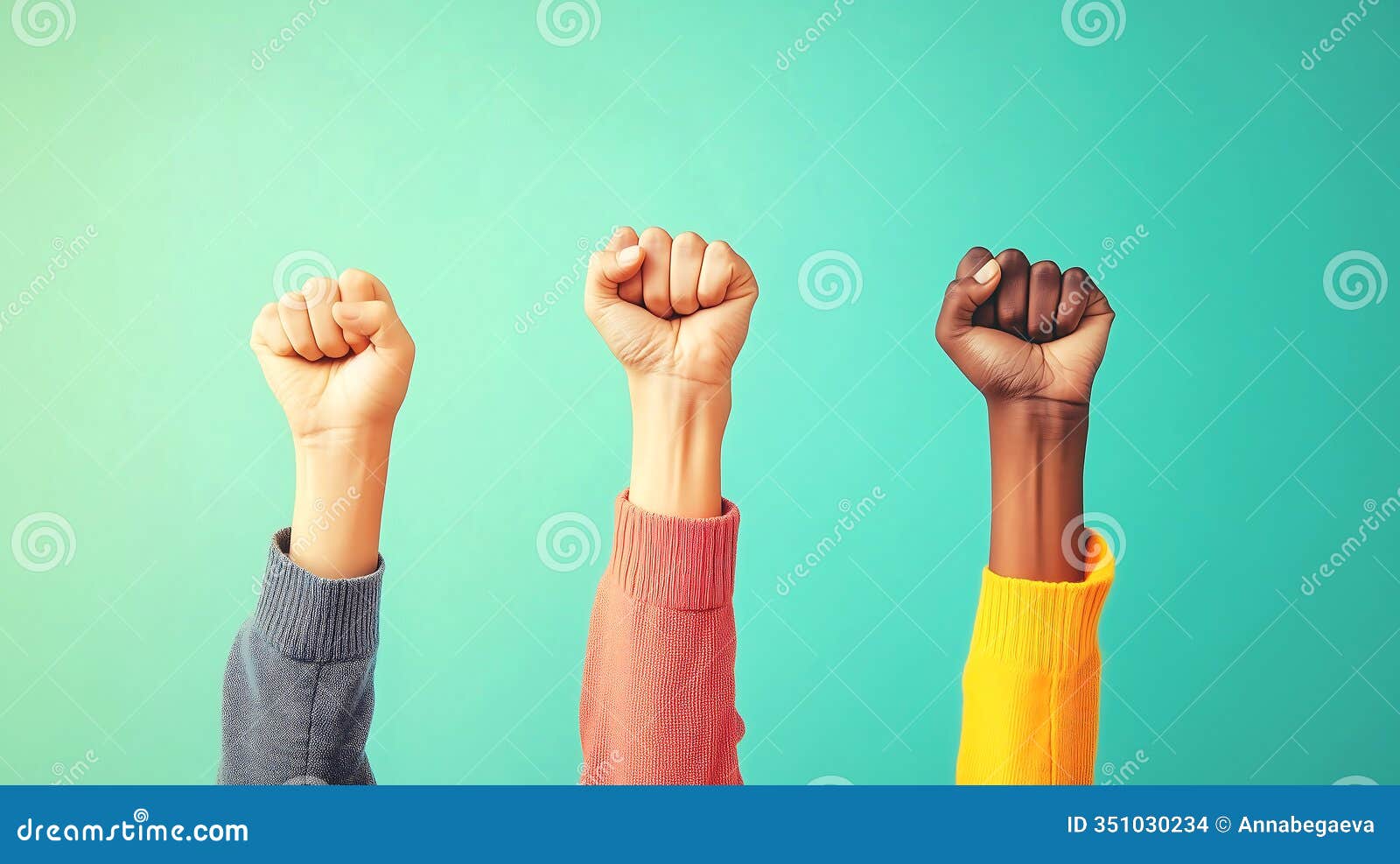 black and white hands raised up in a fist on pastel green background. diversity, equity and inclusion concept