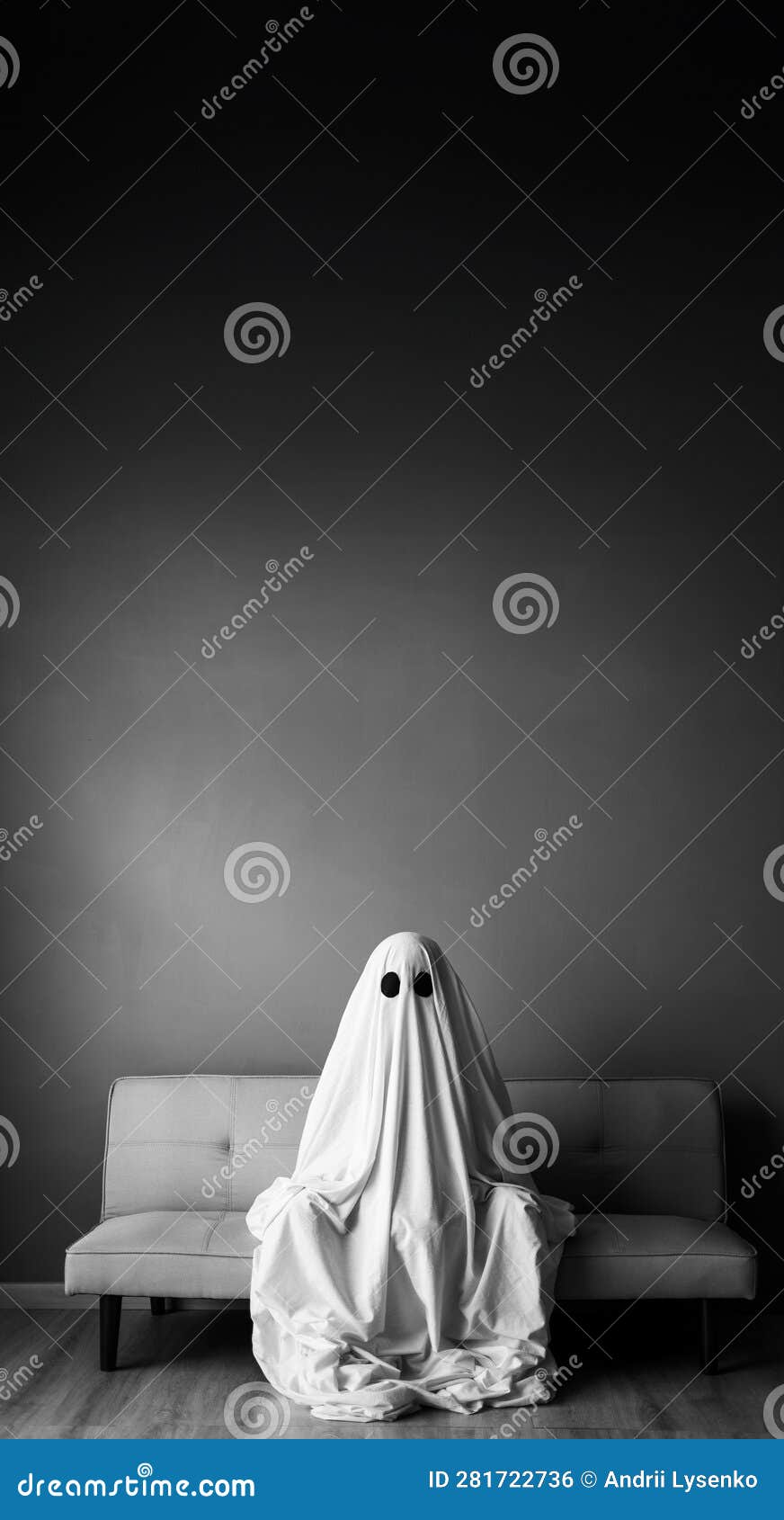 Black and White Photo of a Ghost Sitting on the Couch in House