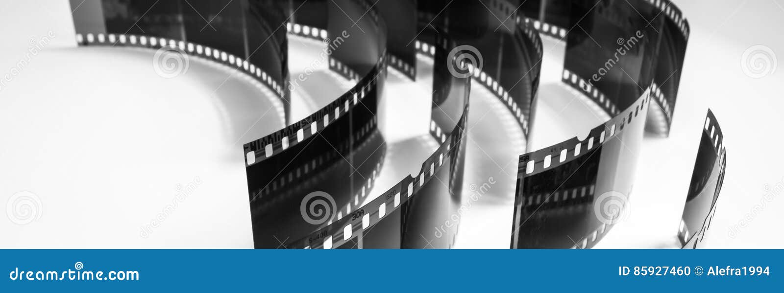 Black and White Photo of Old Negatives on a White Background Stock