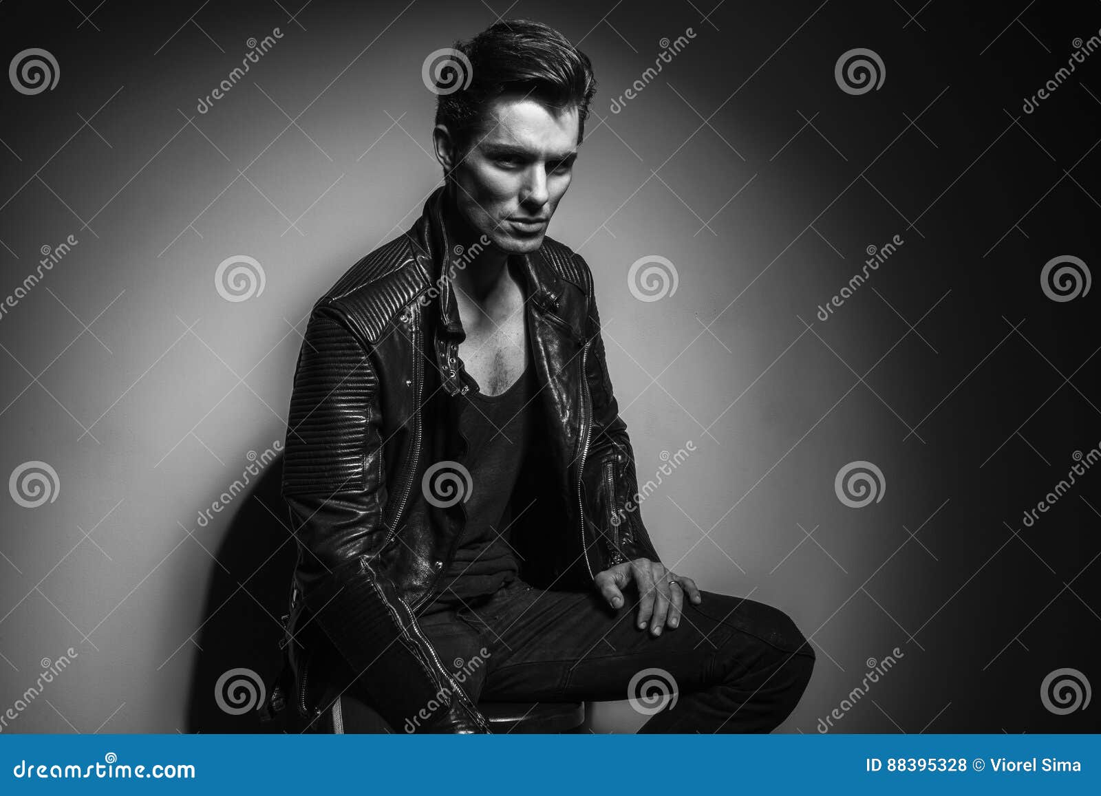 Black and White Picture of Seated Rock and Roll Man Stock Photo - Image ...