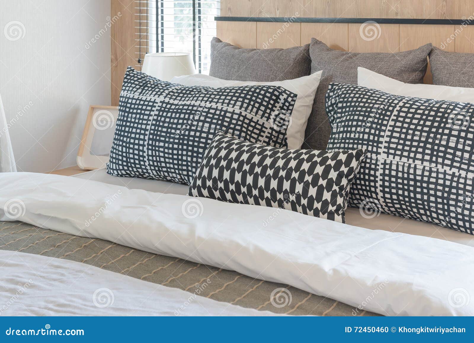 Black and White Pillows on Bed in Modern Bedroom Stock Photo - Image of ...