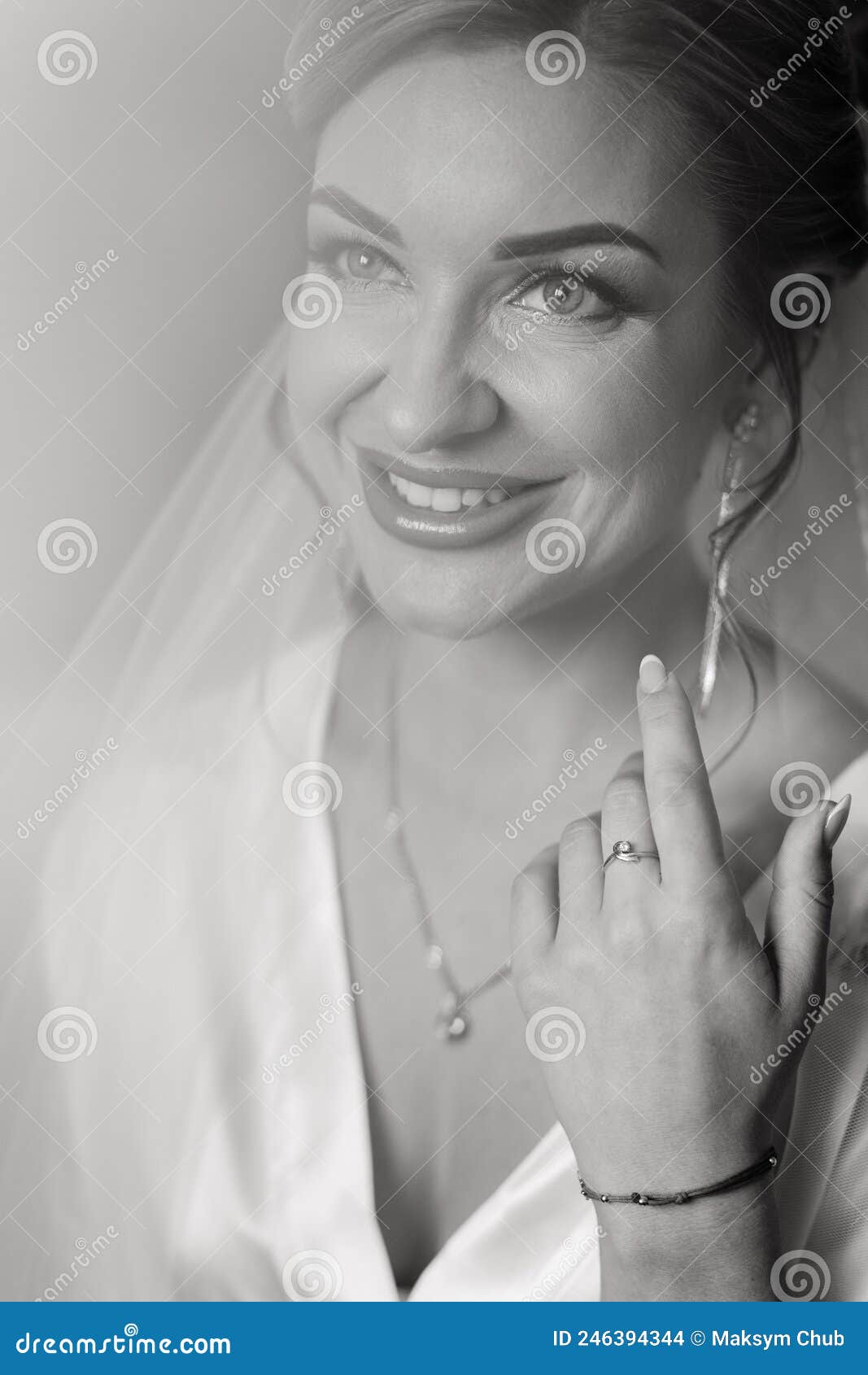 Black and White Portrait of a Bride in a White Bathrobe Stock Photo