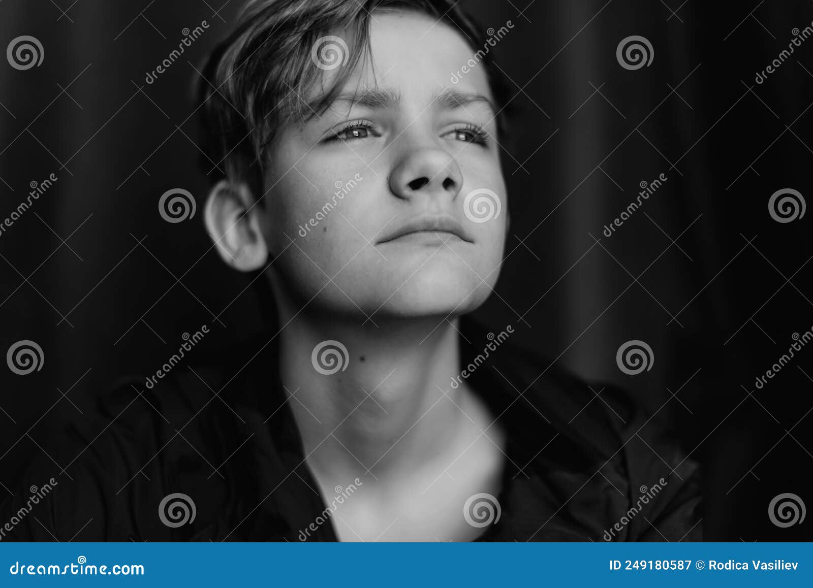 Black and White Portrait of Teenage Boy on Dark Background. Low Key ...