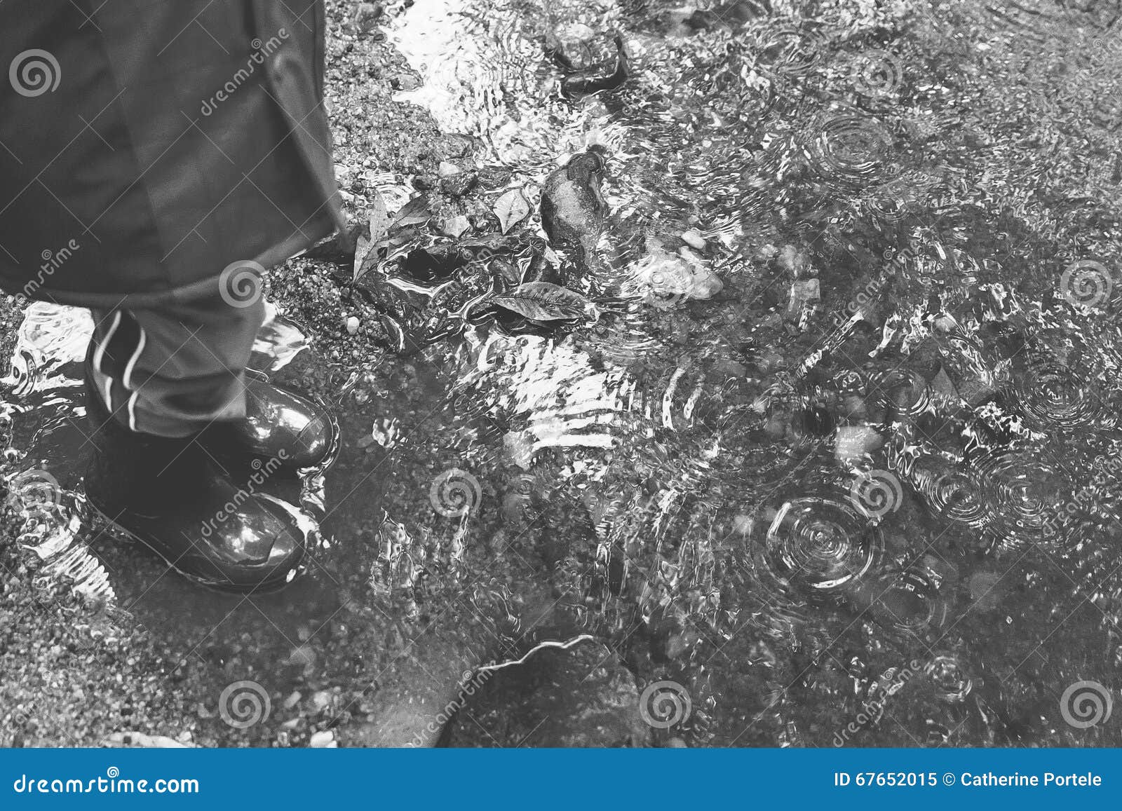 Black and White Puddles with Rain Boots Stock Image - Image of rain