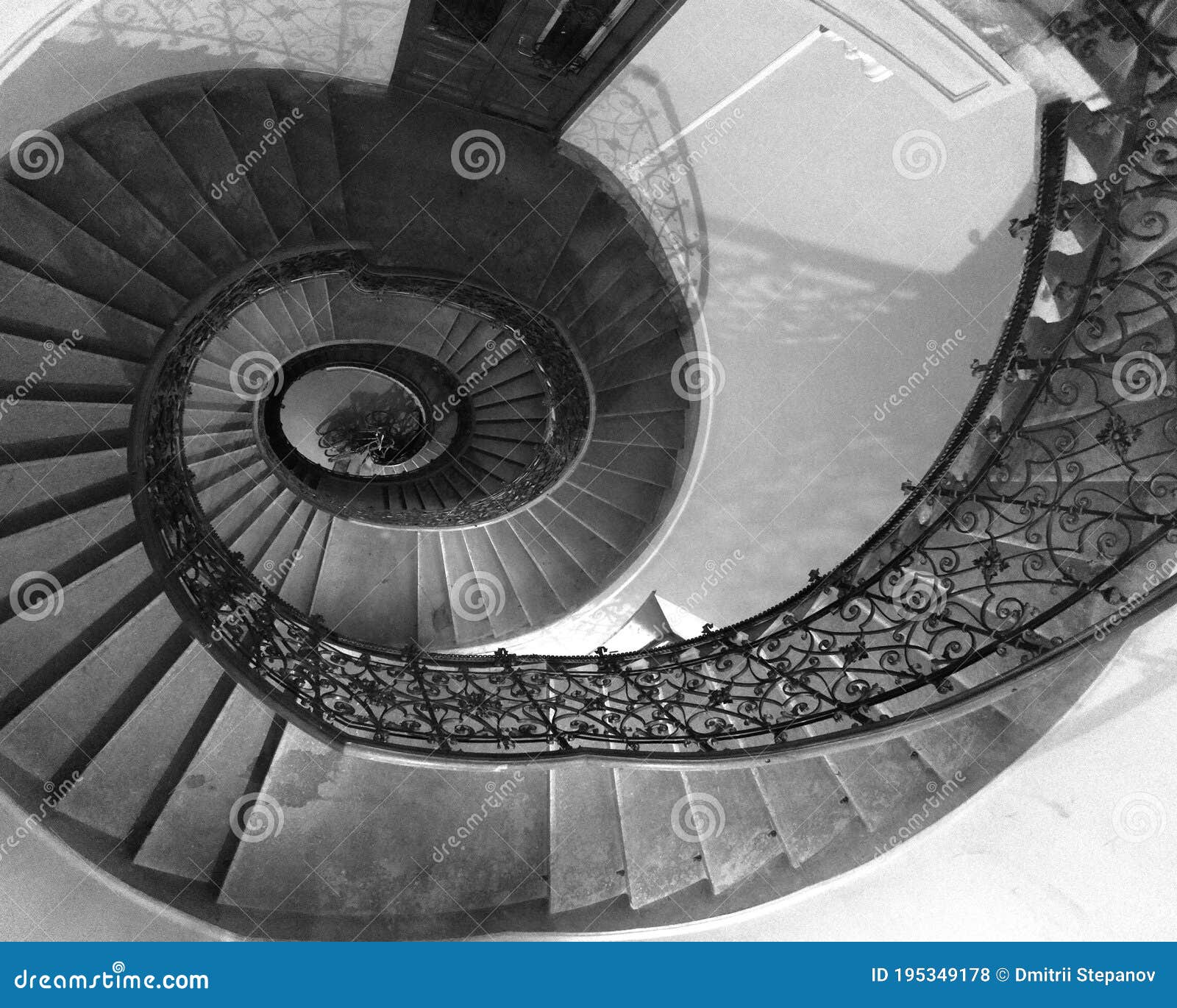 Black and White Round Spiral Staircase with Black Railings with