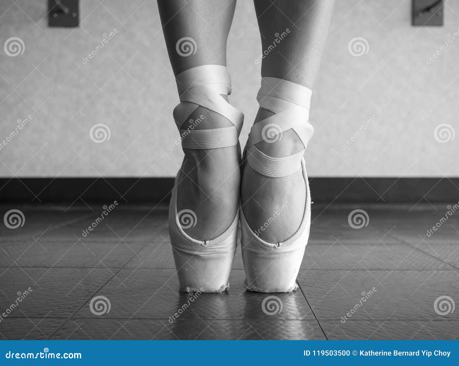 Black and White Version of a Close Up of a Ballet Dancer`s Bare Feet in Pointe Shoes Stock Photo