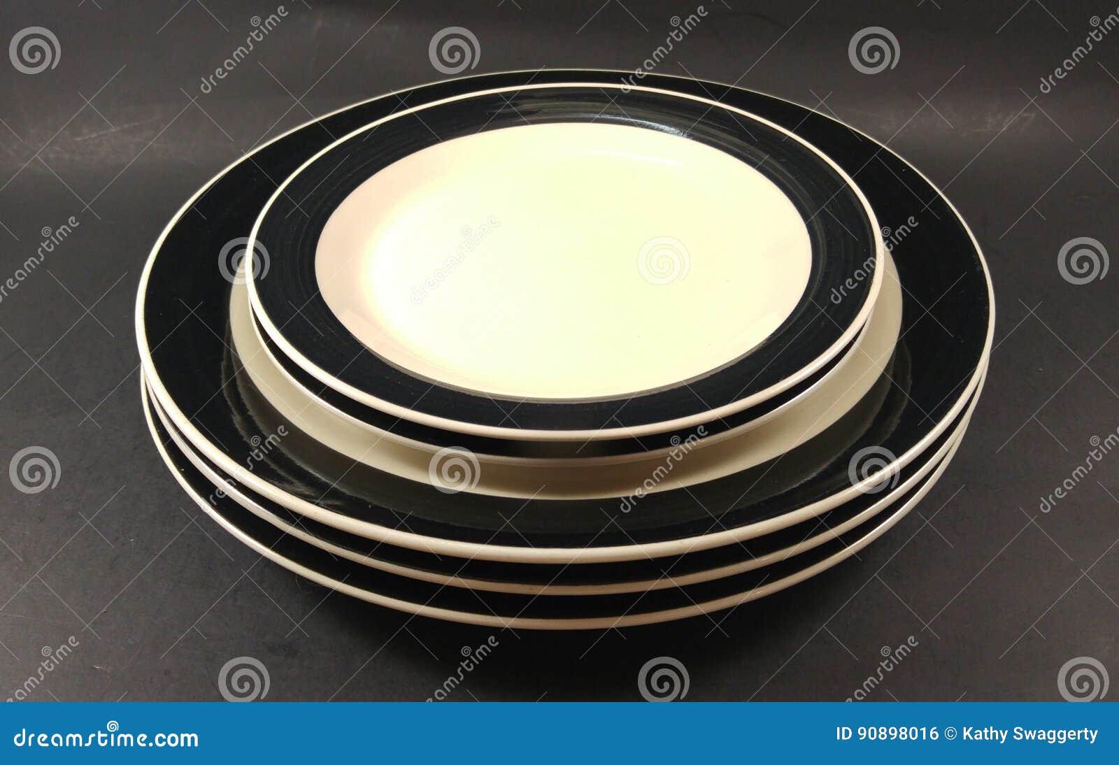 Black and White Vintage Antique Dinner Plates and Saucers Stock Photo