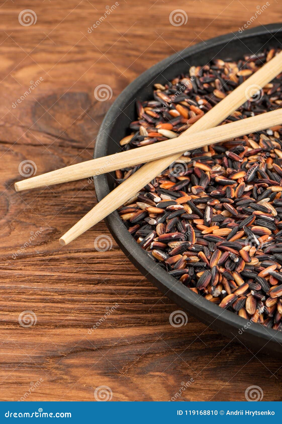 Black rice in pan stock photo. Image of dark, close 119168810