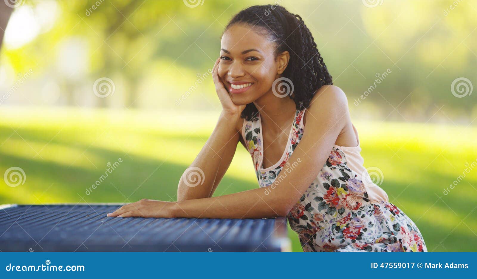 Woman in Black Brassiere and Black Leggings Sitting on Brown Wooden Bench ·  Free Stock Photo