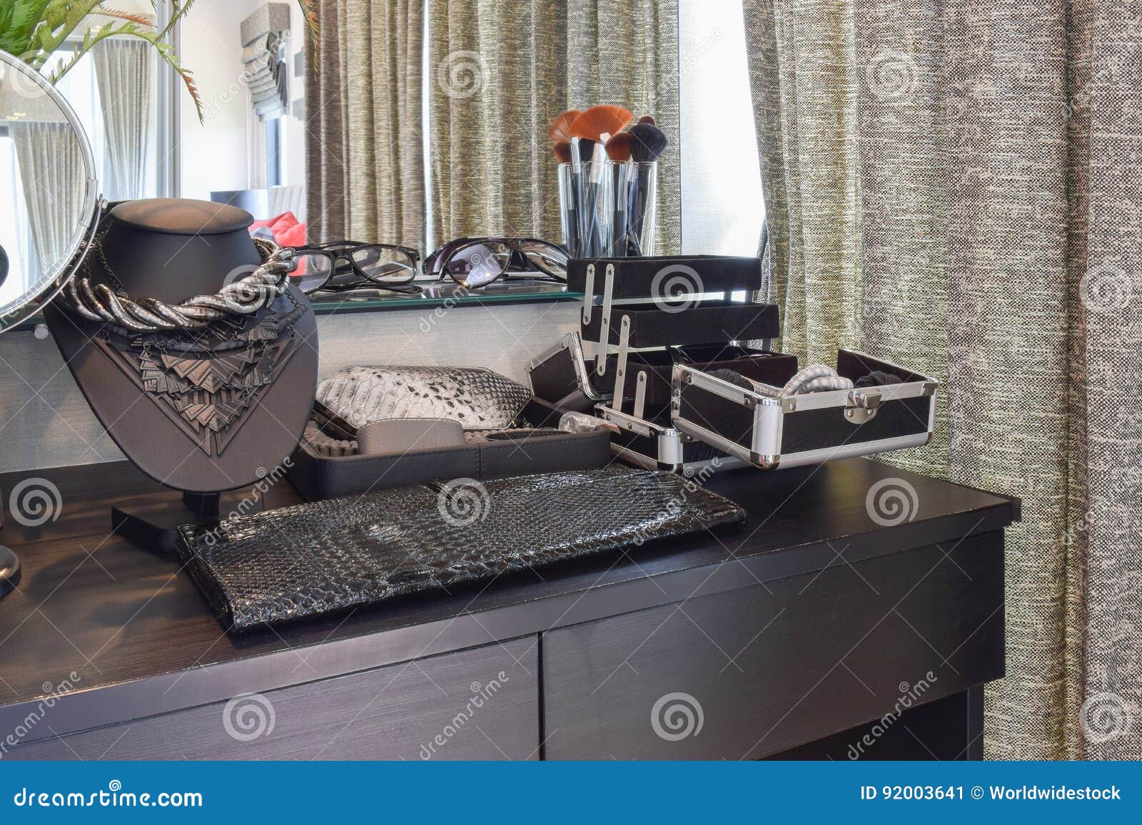 Black Wooden Dressing Table with Accessories at Home Stock Image