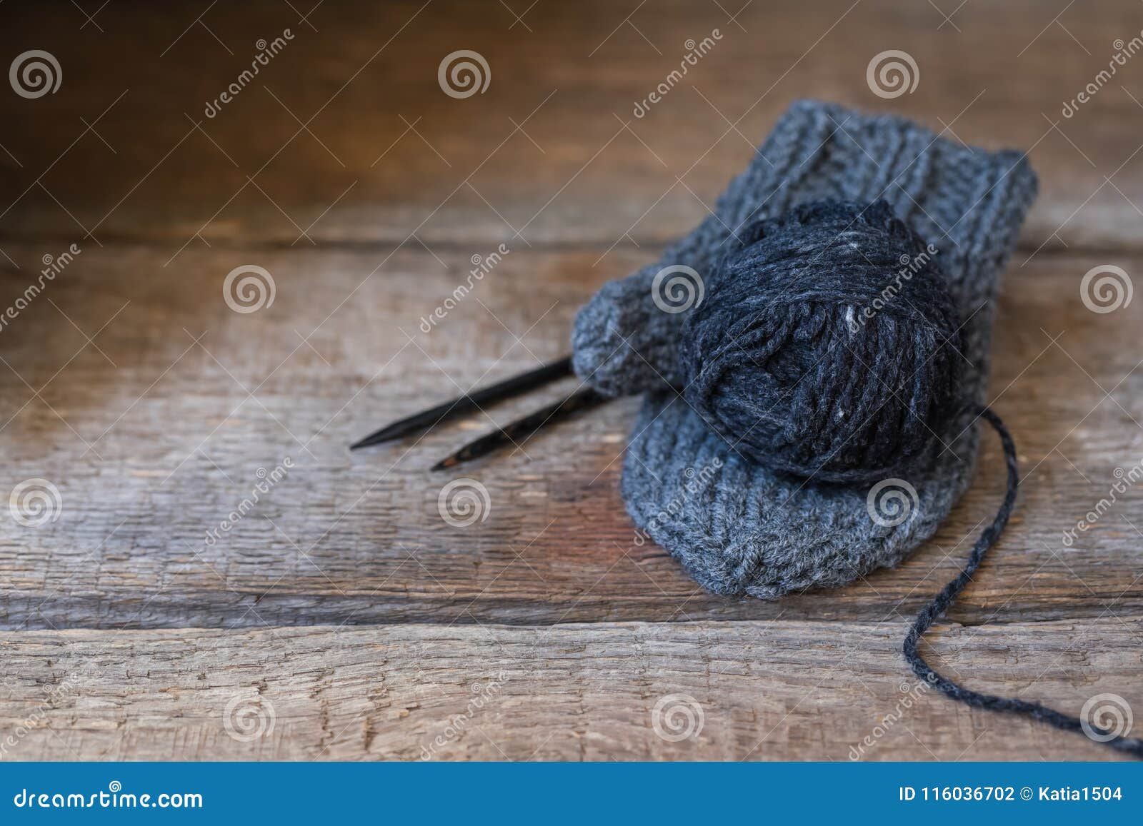 Black Wool Yarn on the Handmade Mitt, Rustic Wabi Sabi Style Background ...