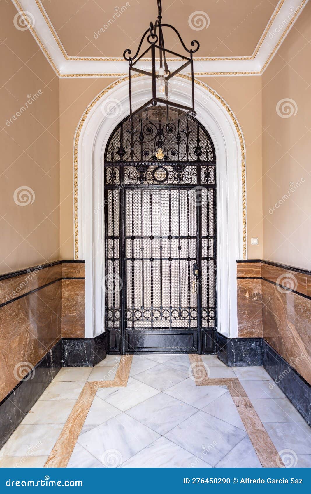 Black Wrought Iron Bar Door with Glass Window from 1907 Stock Photo