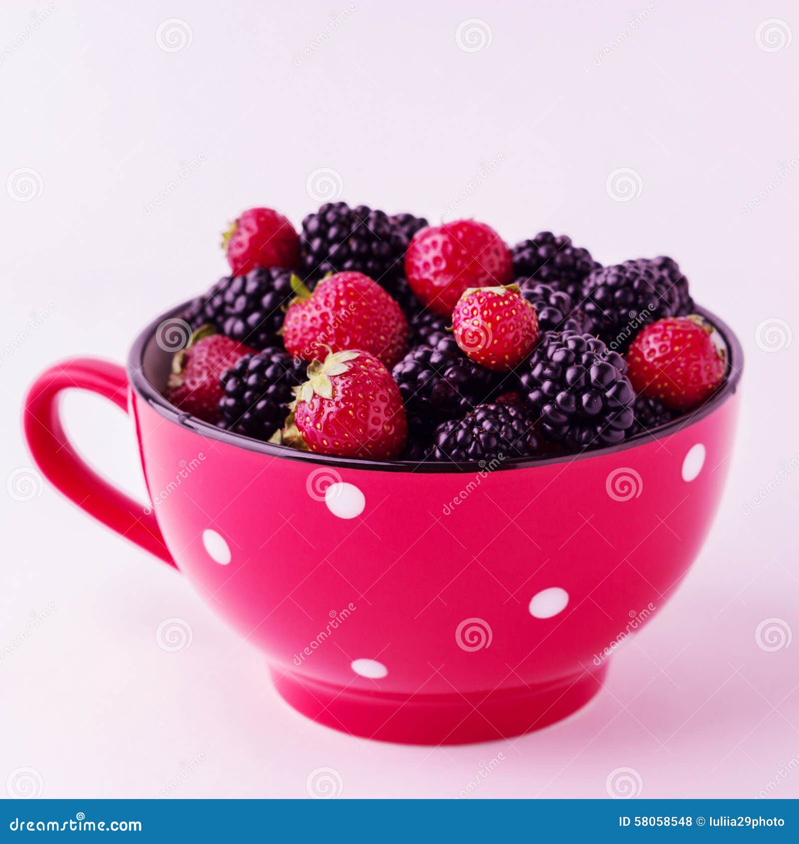 Blackberries and Strawberries in a Red Plate. Isolated Backgroun Stock ...