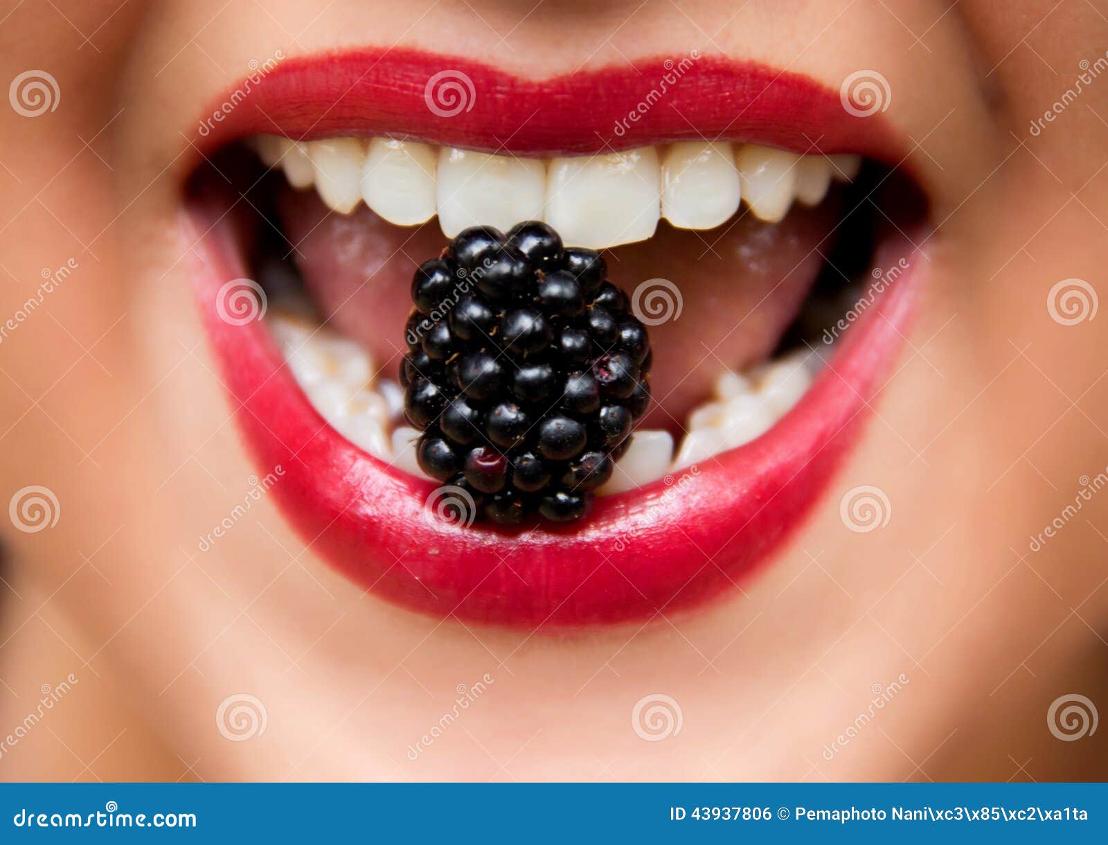 Blackberry in Woman Mouth stock photo. Image of rouge 43937806