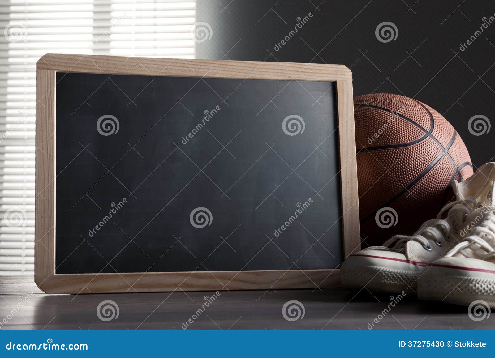 Blackboard with Canvas Shoes and Basketball Stock Photo - Image of ...