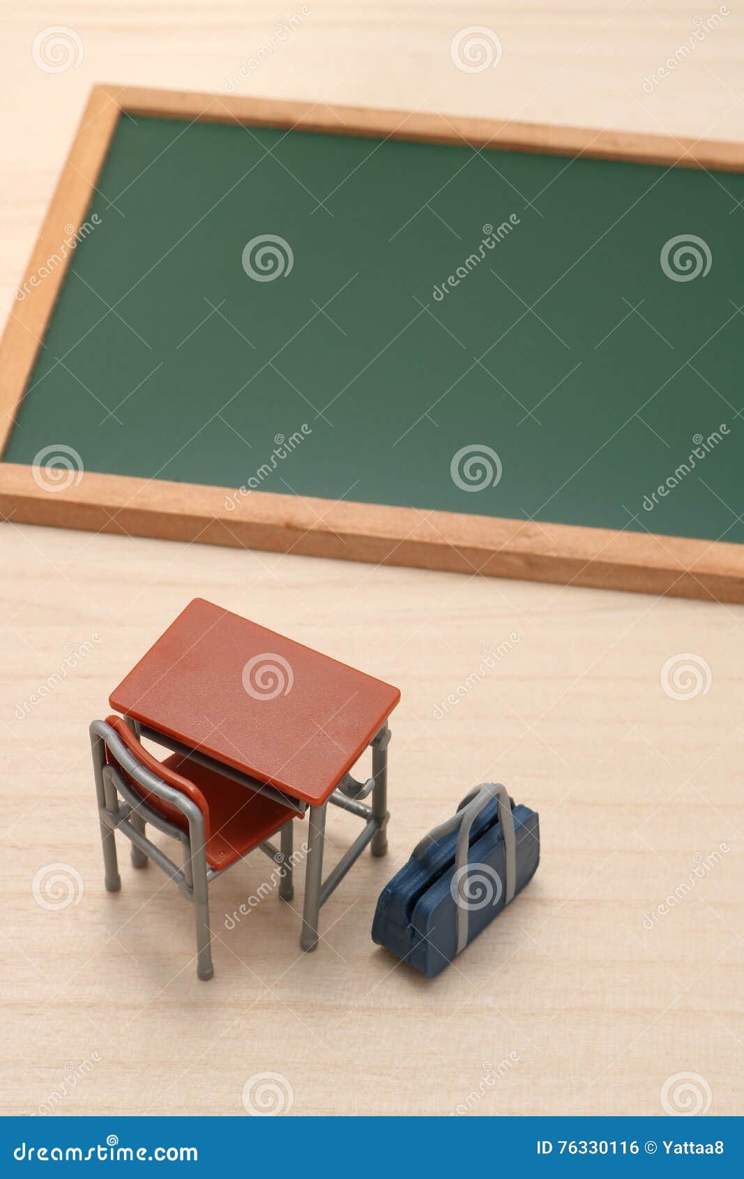 Blackboard, Desk, and School Bag on Wood. Stock Photo Image of