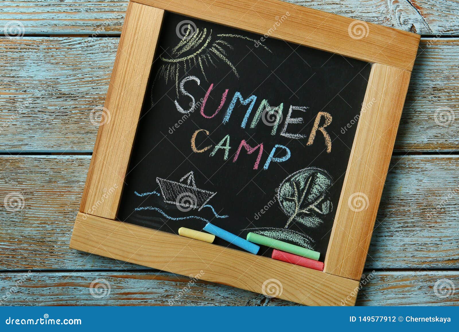 Blackboard With Text Summer Camp Drawings And Chalk Sticks On Wooden Background Stock Photo Image Of Childhood Board Blackboard With Text Summer Camp Drawings And Chalk Sticks On Wooden Background Stock Photo Image Of Childhood Board