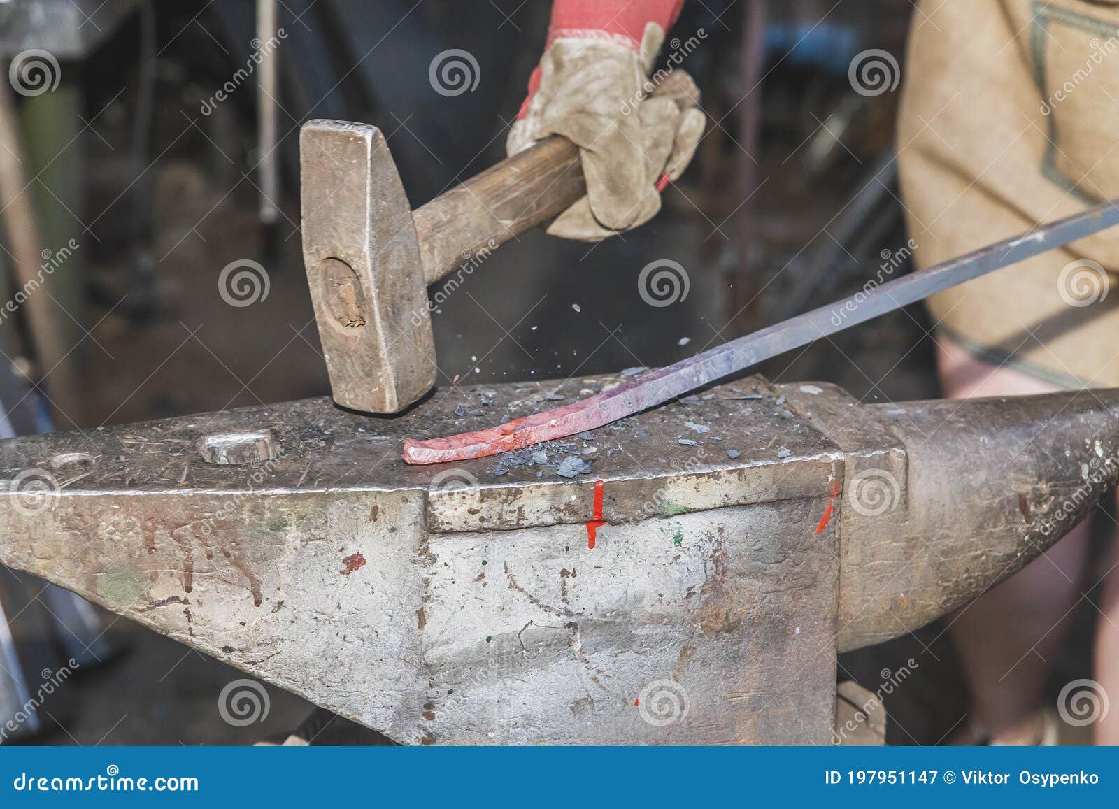 The Blacksmith Hits the Redhot Rod with a Hammer Stock Image Image