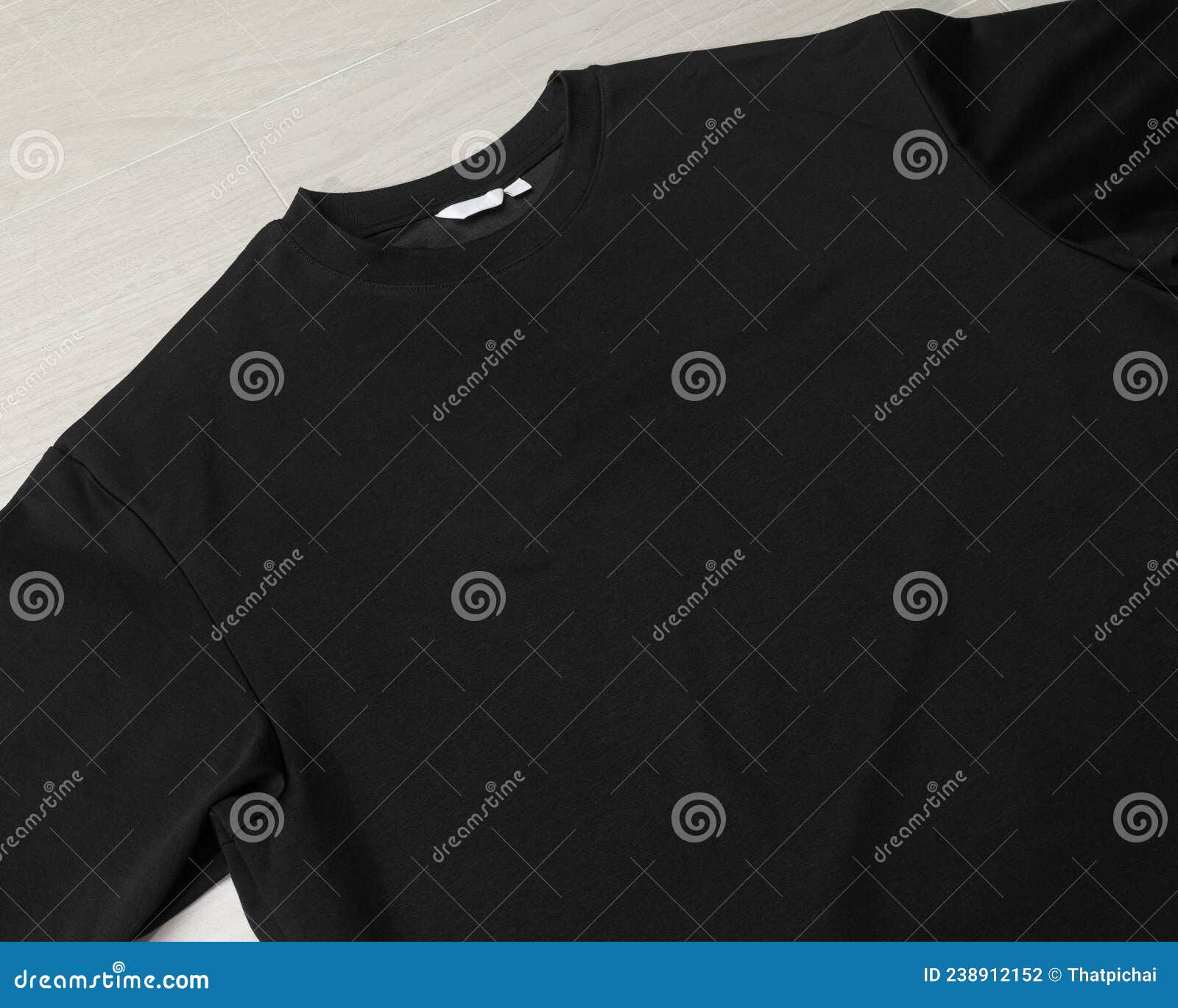 Blank Black Oversized T-shirt Mockup Template on the Floor. Stock Photo ...