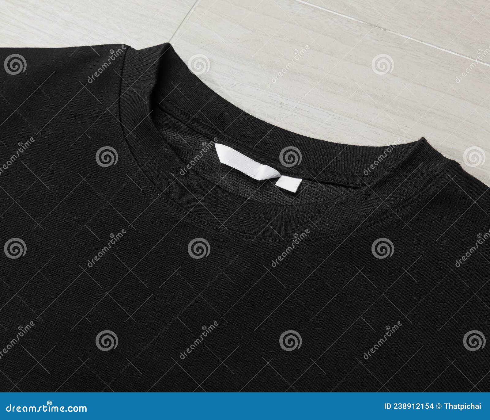 Blank Black Oversized T-shirt Mockup Template on the Floor. Stock Photo ...