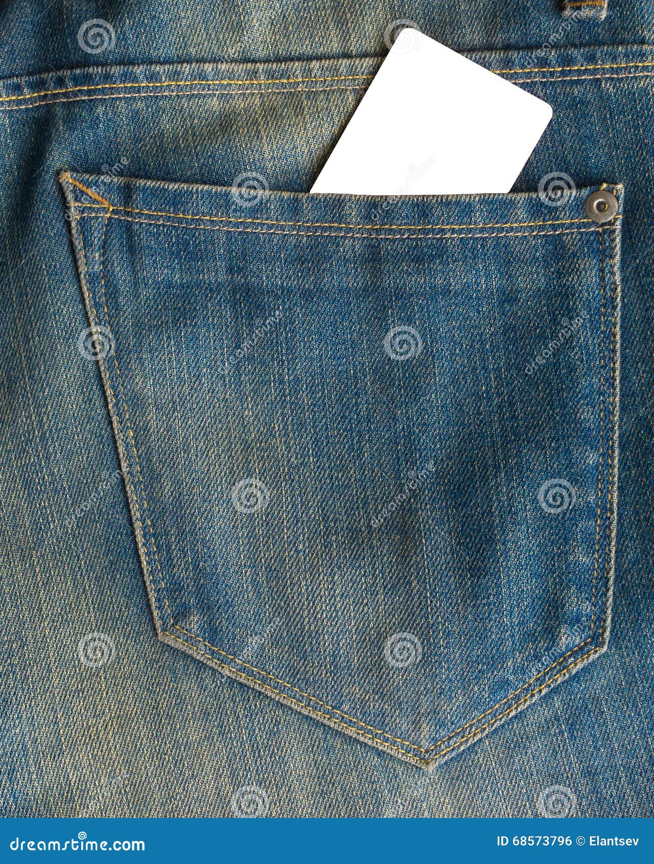 Blank Business Card in a Pocket of Blue Worn Out Jeans. Stock Photo