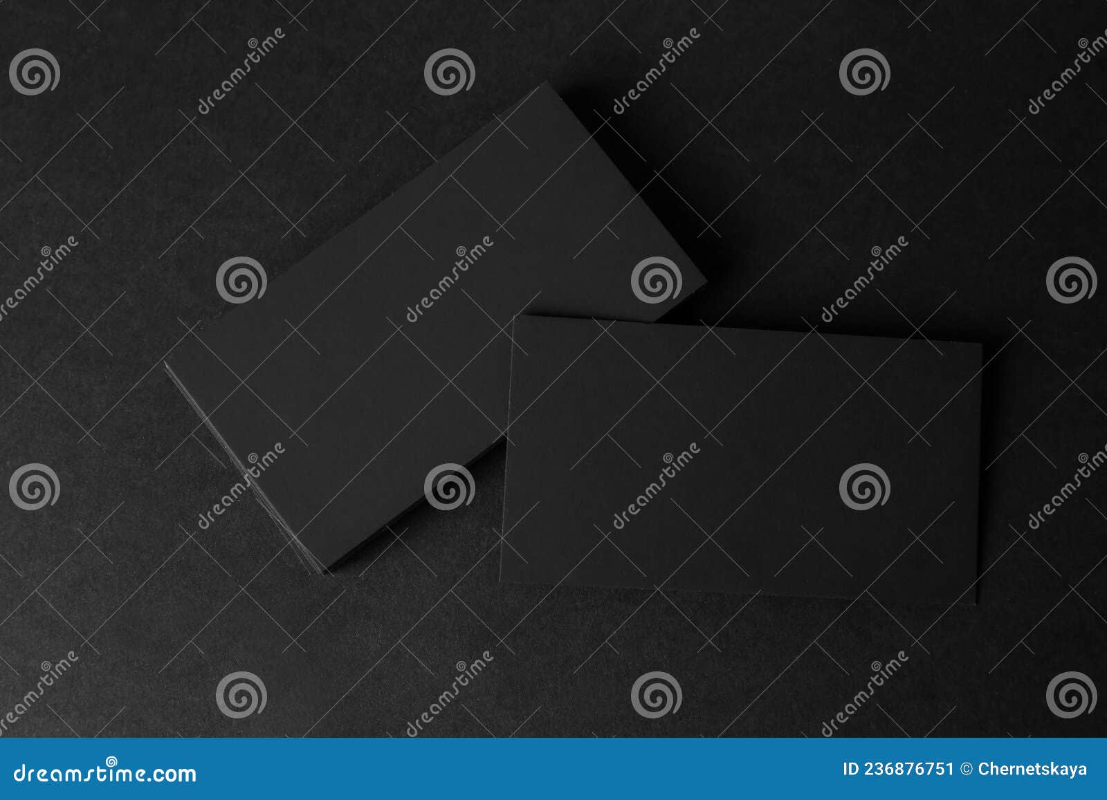 Blank Business Cards on Black Background, Flat Lay. Mockup for Design