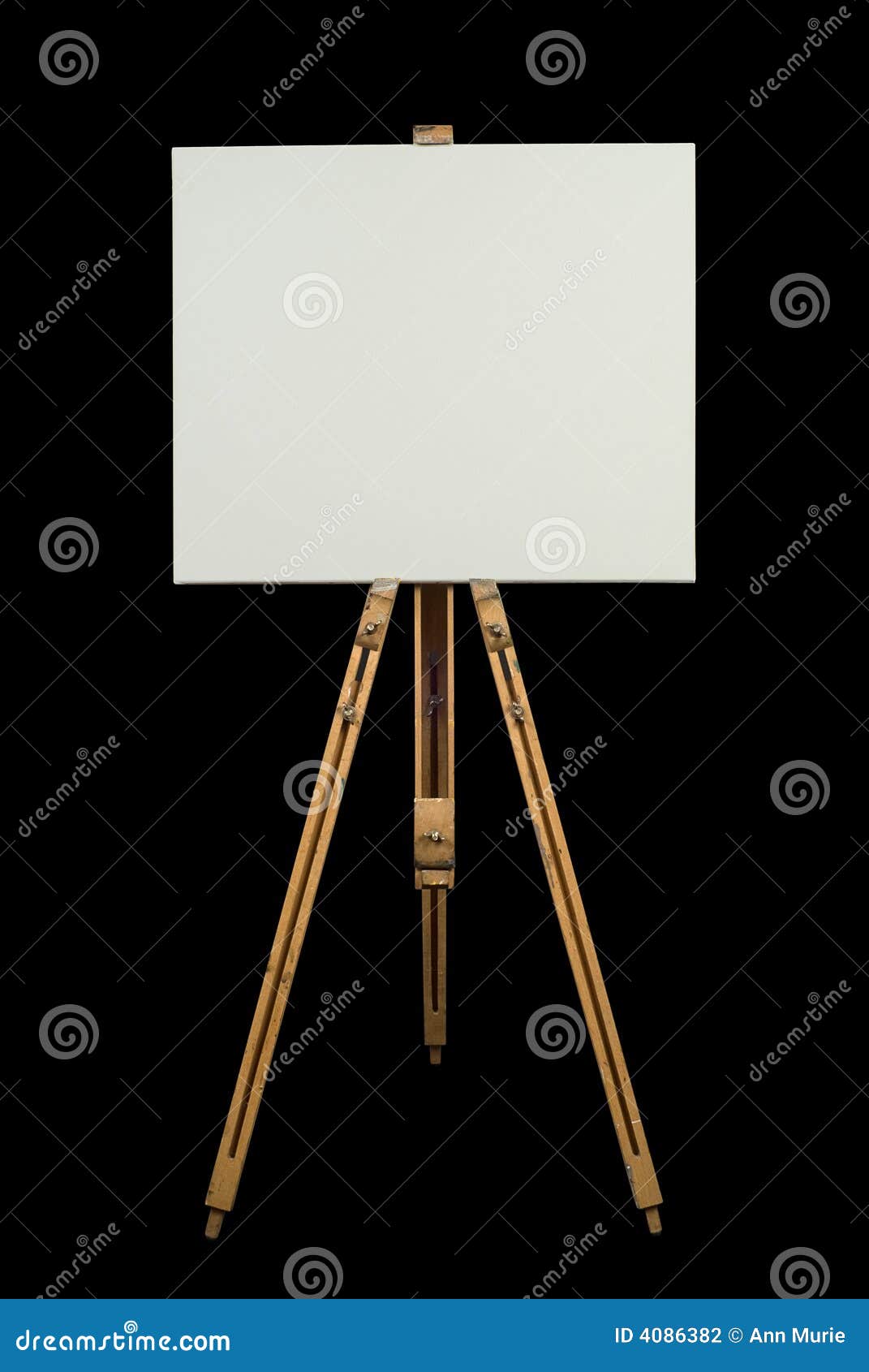 Small Easel with White Blank Cloth on a Wooden Table. Miniature