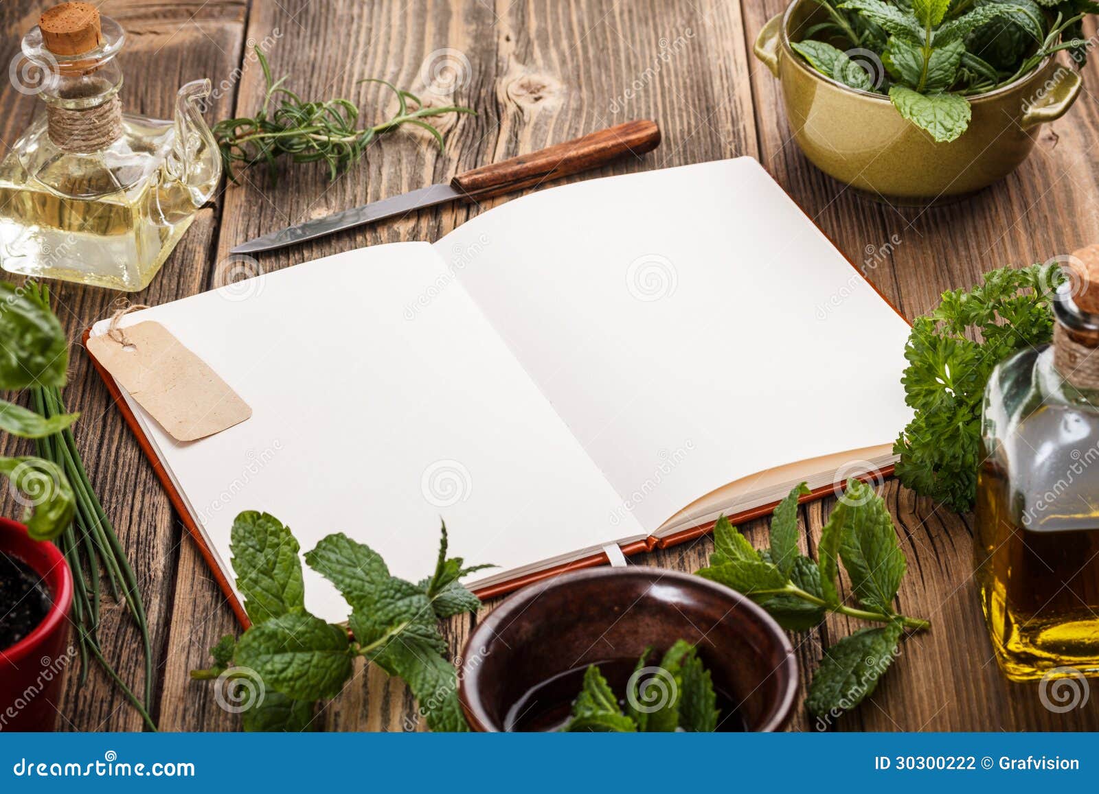 Blank Cookbook With Basic Ingredients For Baking Stock Photo