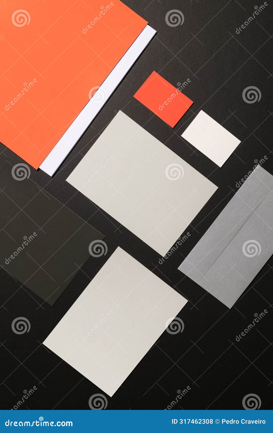 blank corporate stationery on dark background. mocks the brand. orange tones