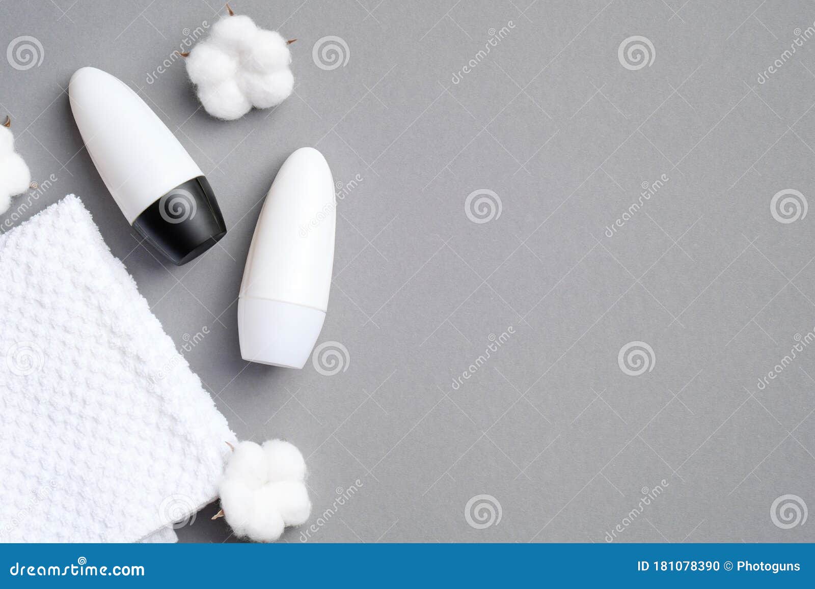 Download Blank Deodorant Bottles With Cotton And Towel On Grey Background. Roll-on Antiperspirant ...