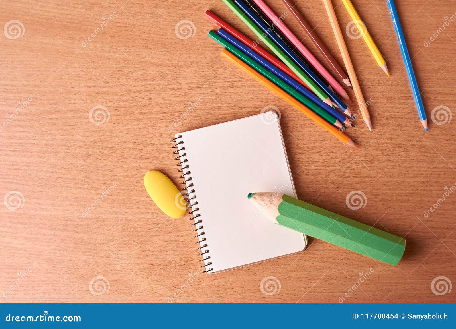 Blank Notebook Page With Colored Pencils On Table Stock ...