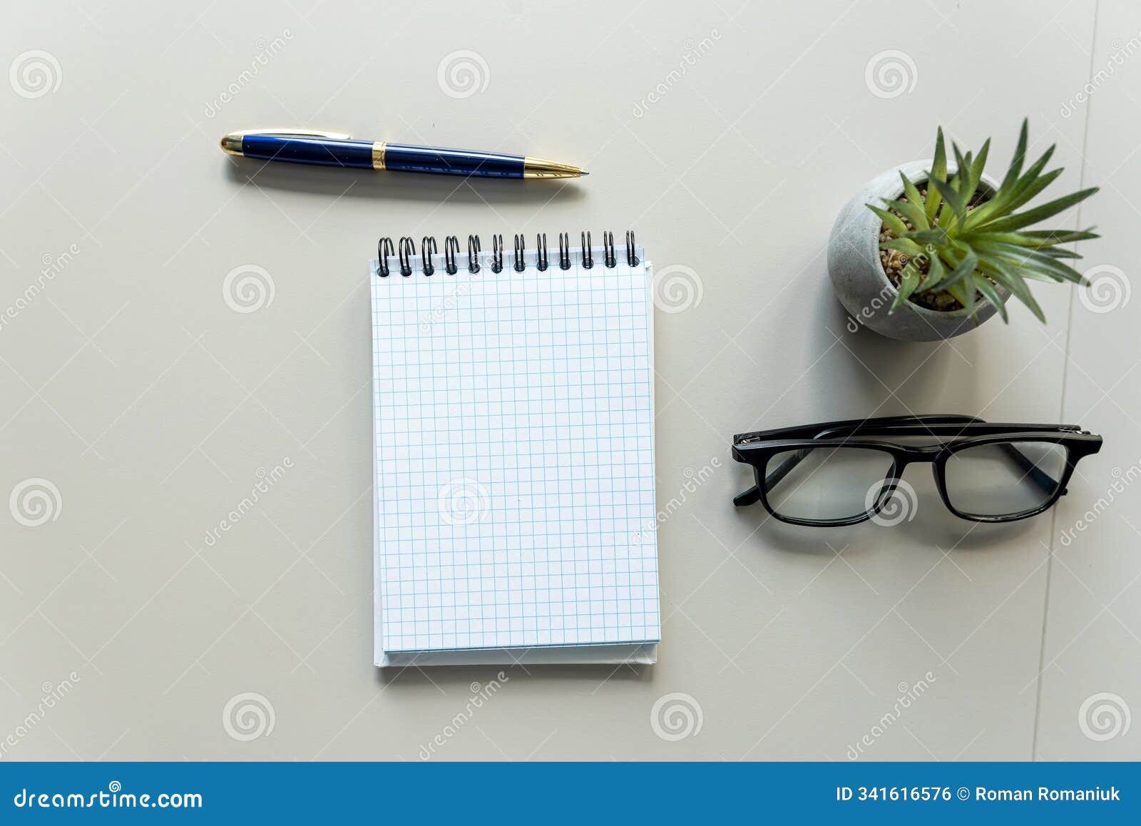 blank notebook with pen, eyesglass on office white workplace. space for your text.