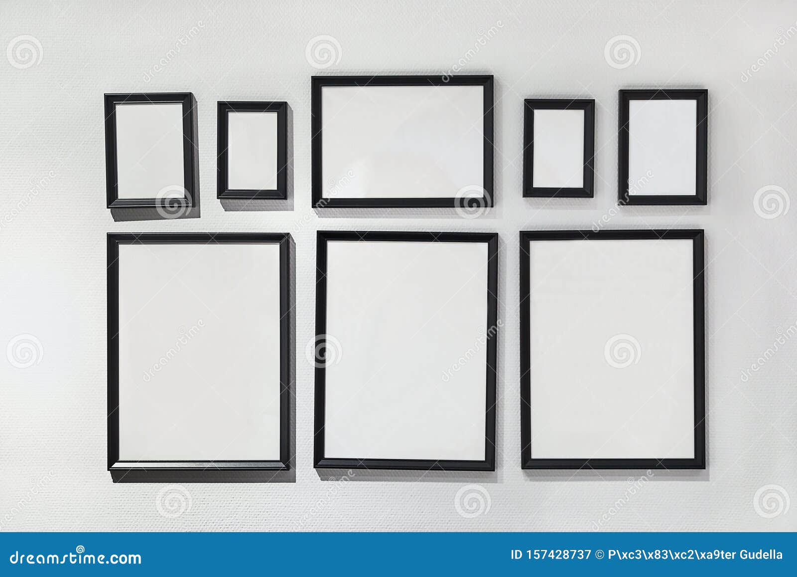 Blank Picture Frames on White Wall Stock Image - Image of framing ...