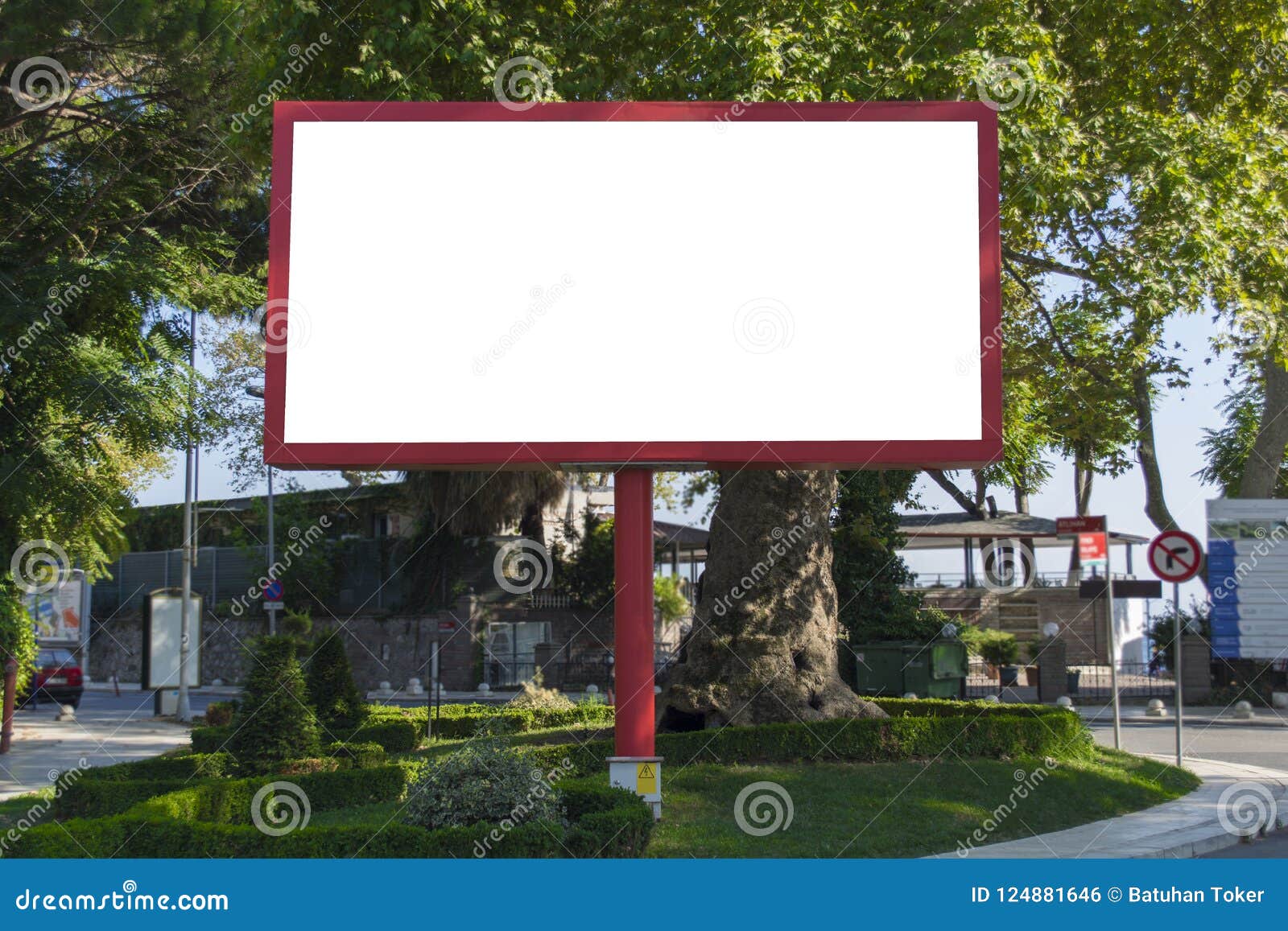blank red billboard on blue sky background for new advertisement in city