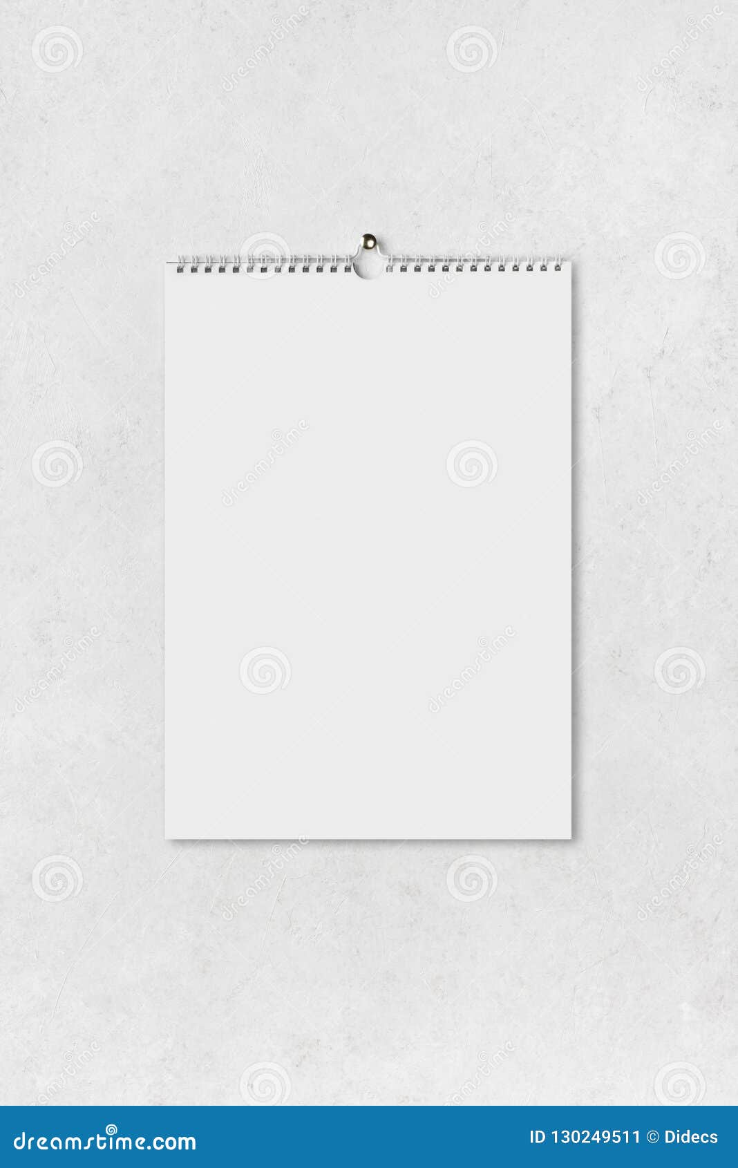 Blank Vertical Paper Sheet of Notebook Hanging on Abstract Wall Stock
