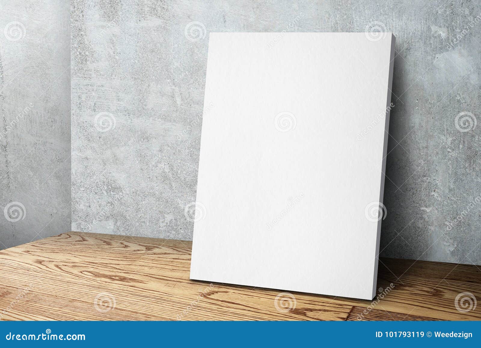 blank white canvas frame leaning at concrete wall and wood floor