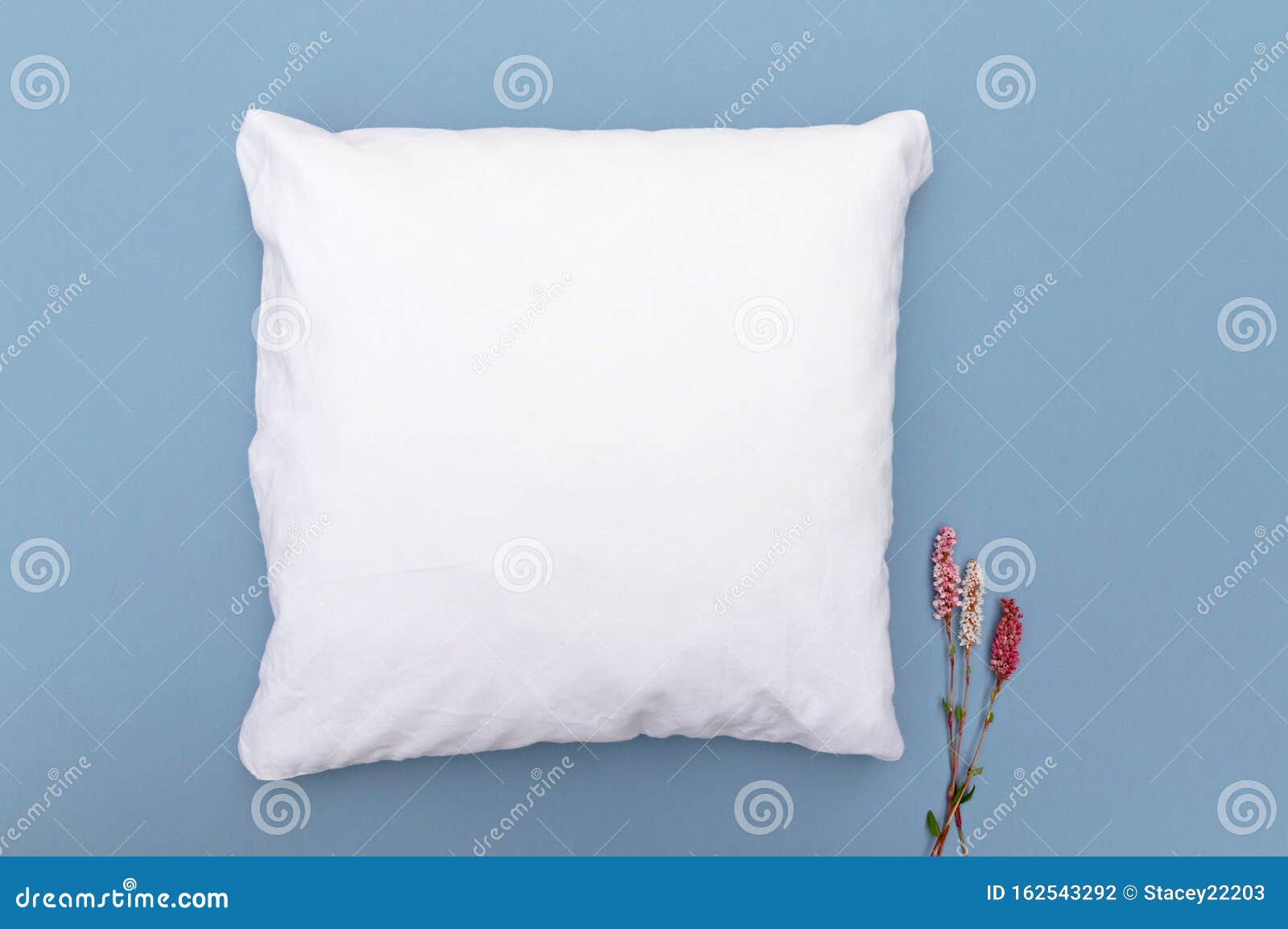 Download Blank White Cushion Pillow Mockup On A Blue Background ...