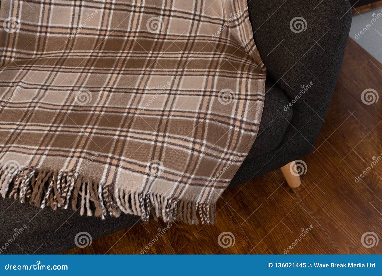 Blanket arranged on sofa stock image. Image of indoors 136021445